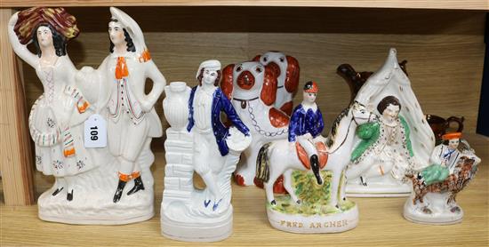 Five Staffordshire flatbacks, a pair of spaniels and two lustre jugs tallest 32cm